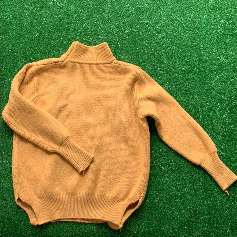 A sweater made with wool material.